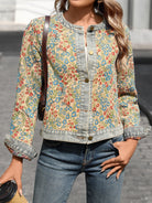 NEWYORKLISTED STYLE COLLECTION: Person wearing a floral denim jacket and jeans, holding a coffee cup.