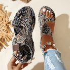 NEWYORKLISTED STYLE COLLECTION
Cutout Printed Bohemian Flat Sandals in Black