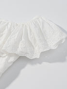 NEWYORKLISTED STYLE COLLECTION: White lace top on a white background
