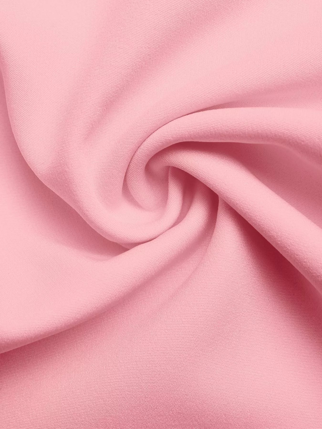 NEWYORKLISTED STYLE COLLECTION: Close-up of pink fabric with a swirl pattern