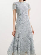 NEWYORKLISTED STYLE COLLECTION: Gray lace dress on a white background