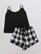 NEWYORKLISTED Intimate Apparel: Black camisole and plaid shorts set on a textured white background