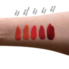NEWYORKLISTED COSMETIC COLLECTION: Lipstick swatches on a person's arm with color names labeled.