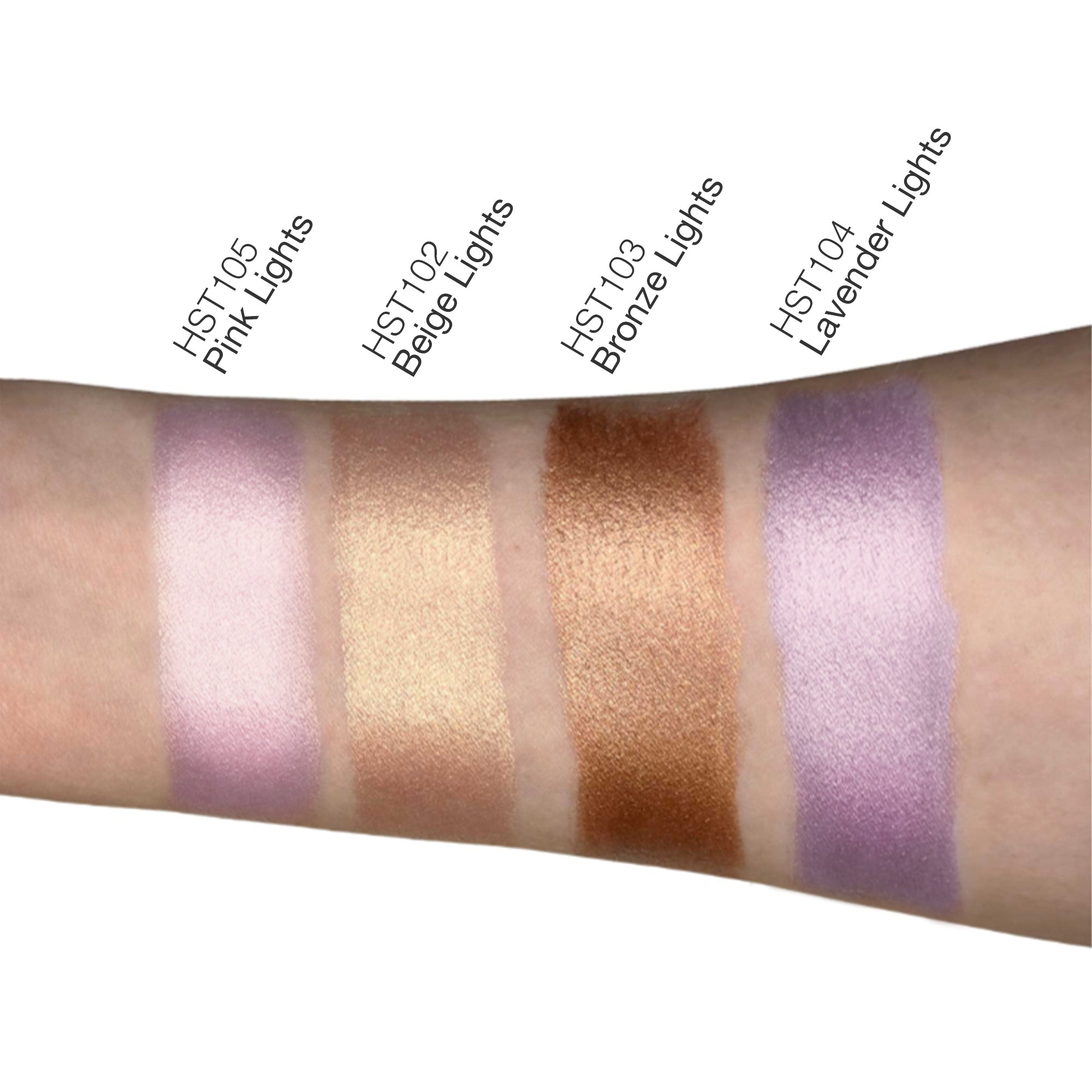 NEWYORKLISTED Cosmetic Collection: Color swatches on a arm with labels for HST103 Pink Lights, HST102 Beige Lights, HST103 Bronze Lights, and HST104 Lavender Lights.