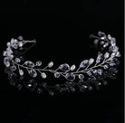 Silver hair vine with beads on a black background