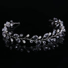 Silver hair vine with beads on a black background