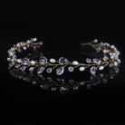 Glowing crystal necklace on a black background