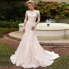 Backless long sleeve lace wedding dress with O-neckline and court train from NEWYORKLISTED Elegant Bride Collection.