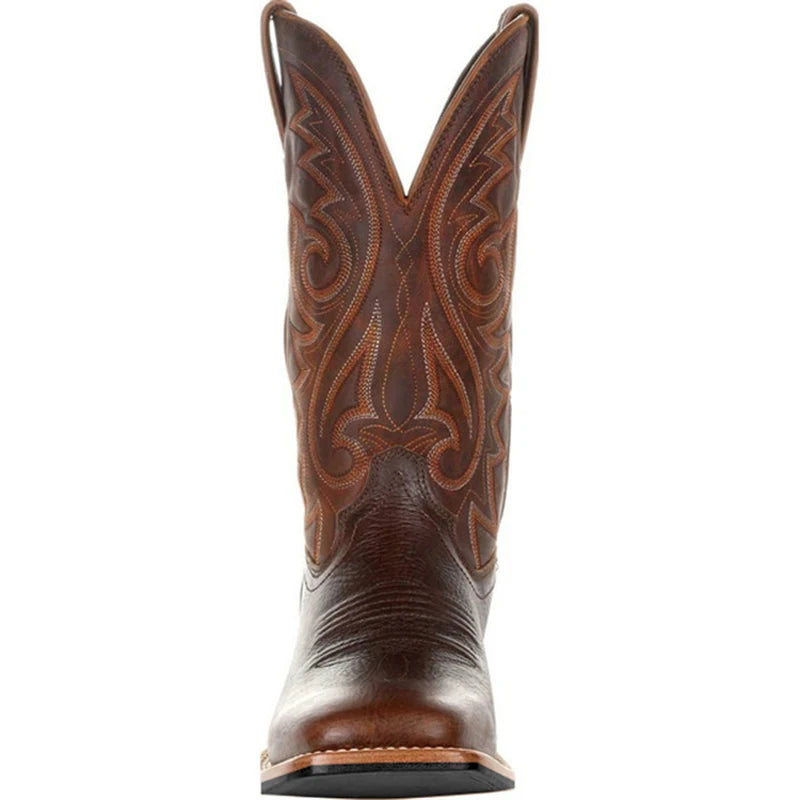 NEWYORKLISTED ATLAS MEN'S COLLECTION: Brown cowboy boot with intricate stitching on a white background