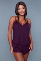 NEWYORKLISTED Intimate Apparel Collection: Emery Cami And Short Set, Woman wearing a purple pajama set against a gray background