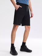 NEWYORKLISTED ATLAS MEN's COLLECTION: Person wearing black shorts on a white background