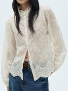 Woman wearing NEWYORKLISTED STYLE COLLECTION lace sheer long sleeve button-front shirt styled as an elegant feminine fashion blouse