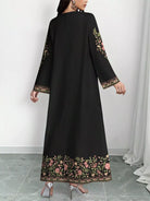 NEWYORKLISTED STYLE COLLECTION: Black dress with floral embroidery on a white background