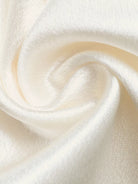 NEWYORKLISTED STYLE COLLECTION: Close-up of white fabric with a soft texture