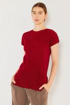 NYLD Model is wearing Red Short Sleeve Knit Shirt 