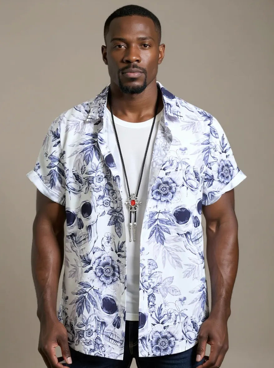 NEWYORKLISTED ATLAS MEN's COLLECTION: Man wearing a white floral shirt over a white t-shirt on a beige background