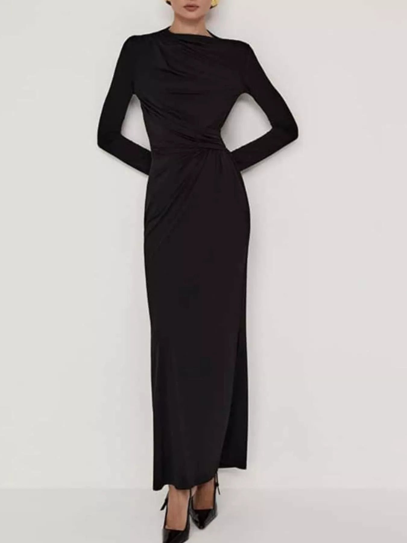 NEWYORKLISTED STYLE COLLECTION: Black evening gown with long sleeves on a white background