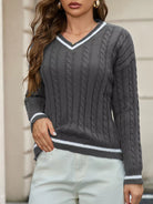 NEWYORKLISTED STYLE COLLECTION: Person wearing a gray cable knit sweater with white trim