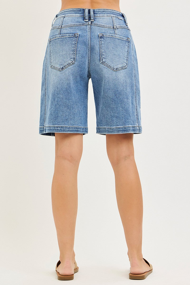 NEWYORKLISTED STYLE COLLECTION: Blue denim shorts worn by a person on a white background