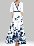 NEWYORKLISTED STYLE COLLECTION: White dress with blue floral pattern on a gray background