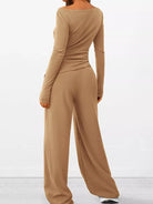 Beige long-sleeve top and wide-leg pants set on a white background