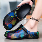 NEWYORKLISTED STYLE COLLECTION: Colorful splatter-patterned clogs being worn with a blurred background