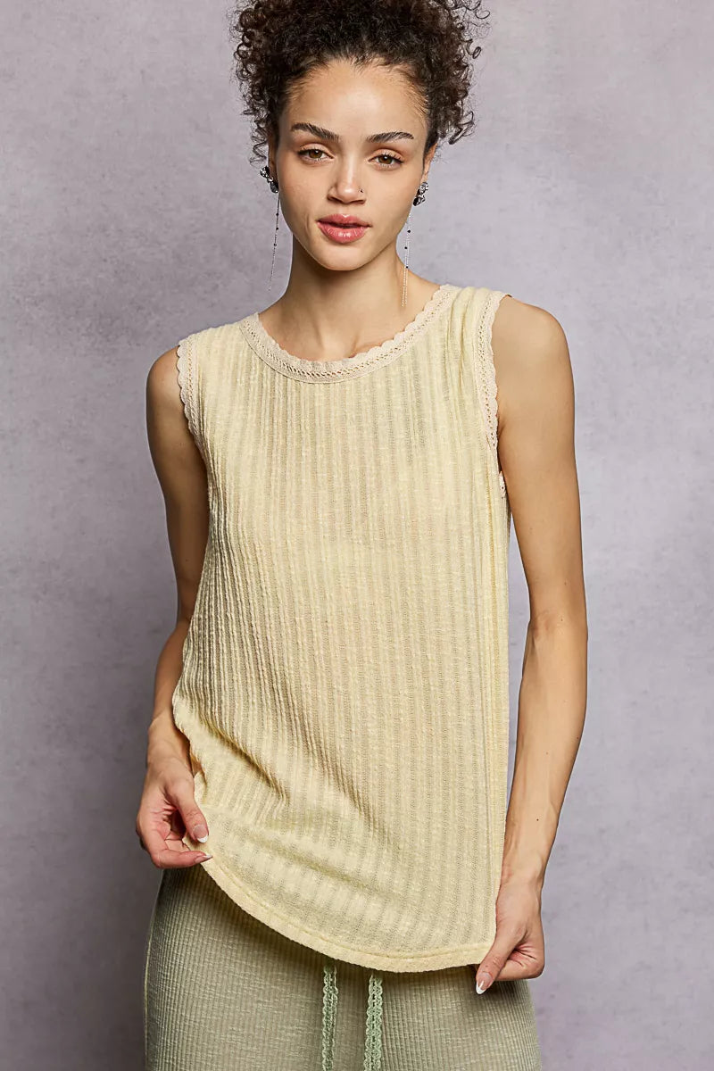 Women’s ribbed round neck tank top with lace trim and high-low hem from the NEWYORKLISTED STYLE COLLECTION