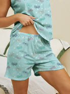 NEWYORKLISTED Intimate Apparel: Light blue pajama set with butterfly pattern on a neutral background