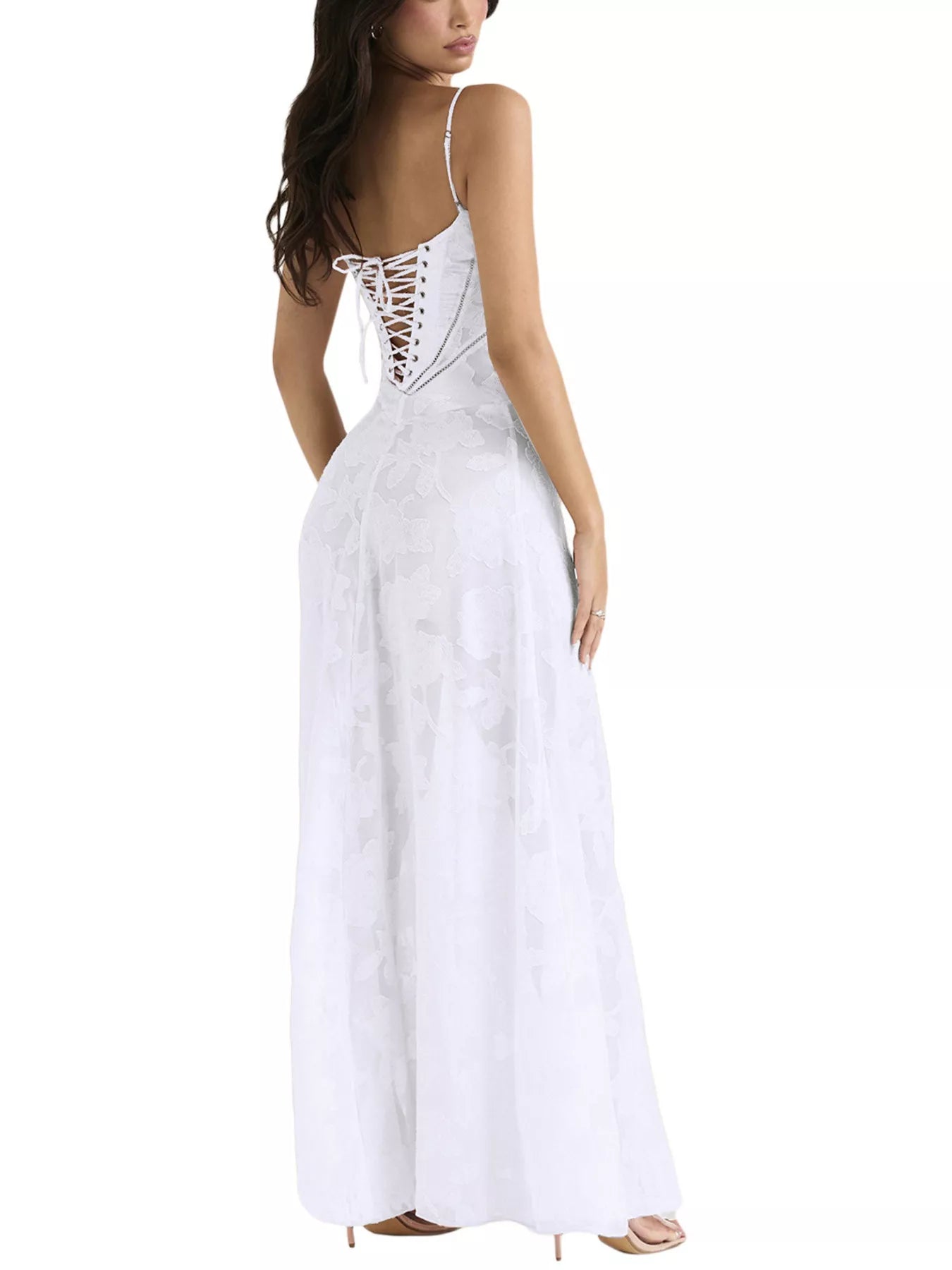NEWYORKLISTED STYLE COLLECTION: White lace-up back dress worn by a model on a white background