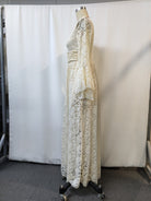 NEWYORKLISTED STYLE COLLECTION: Lace dress on a mannequin against a white background