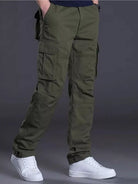 NEWYORKLISTED ATLAS MEN's COLLECTION: Person wearing olive green cargo pants with a plain background