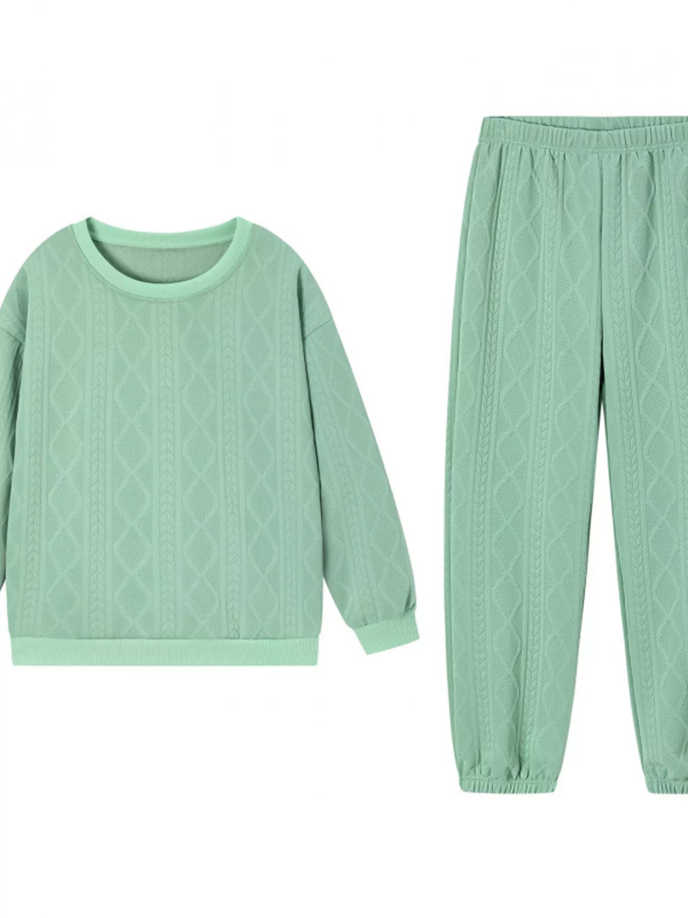 NEWYORKLISTED COMFORT COLLECTION: Green cable knit sweater and pants set on a white background