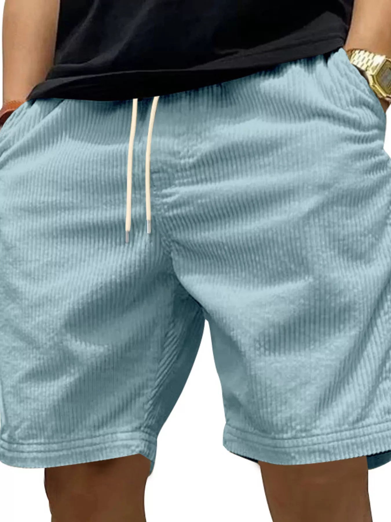 NEWYORKLISTED ATLAS MEN'S COLLECTION: Light blue shorts worn by a person on a white background