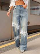 NEWYORKLISTED STYLE COLLECTION: Person wearing light blue jeans with lace details at a train station.
