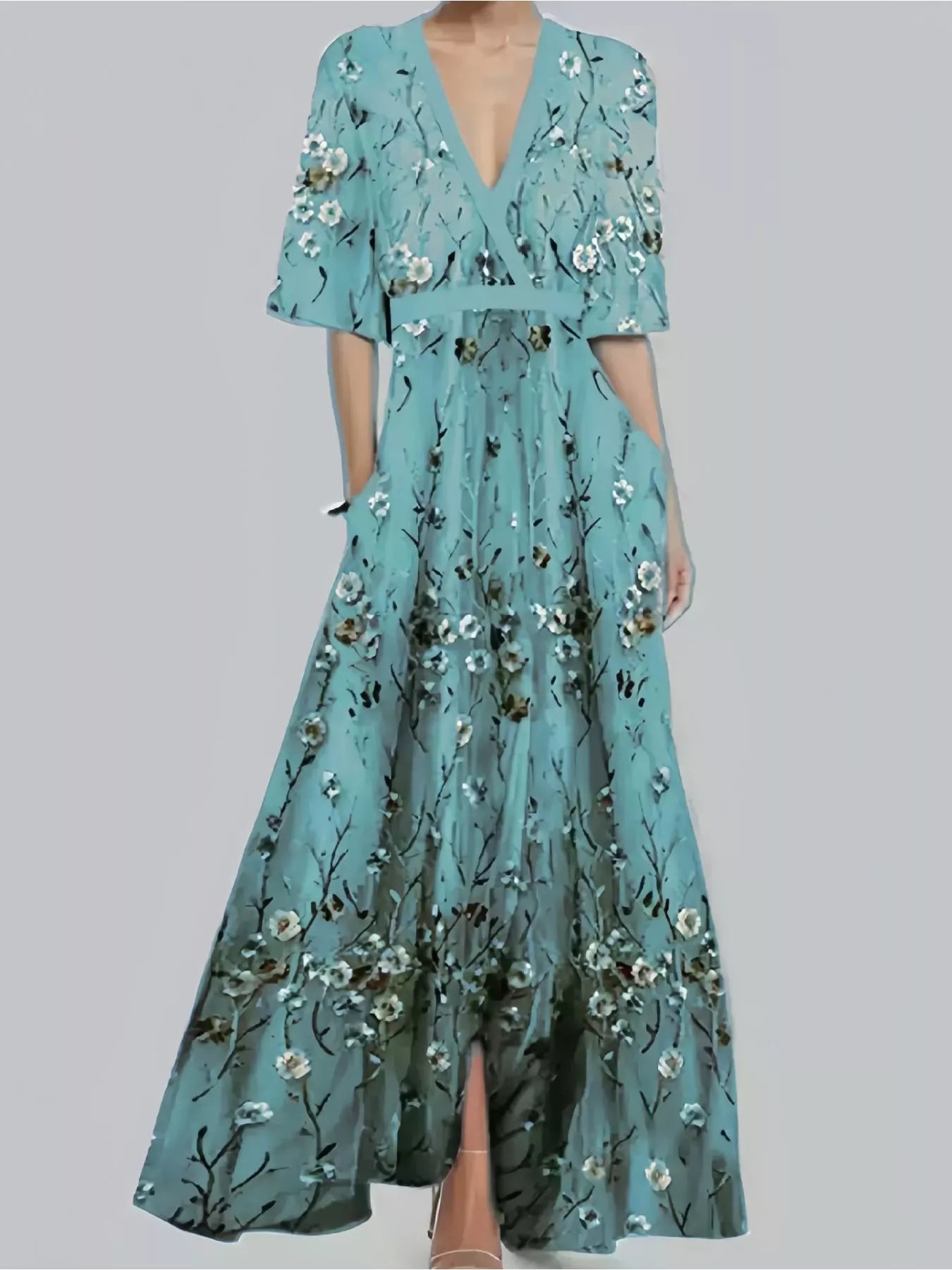NEWYORKLISTED STYLE COLLECTION: Teal floral dress on a plain background