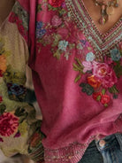 NEWYORKLISTED STYLE COLLECTION: Close-up of a pink embroidered garment with floral patterns