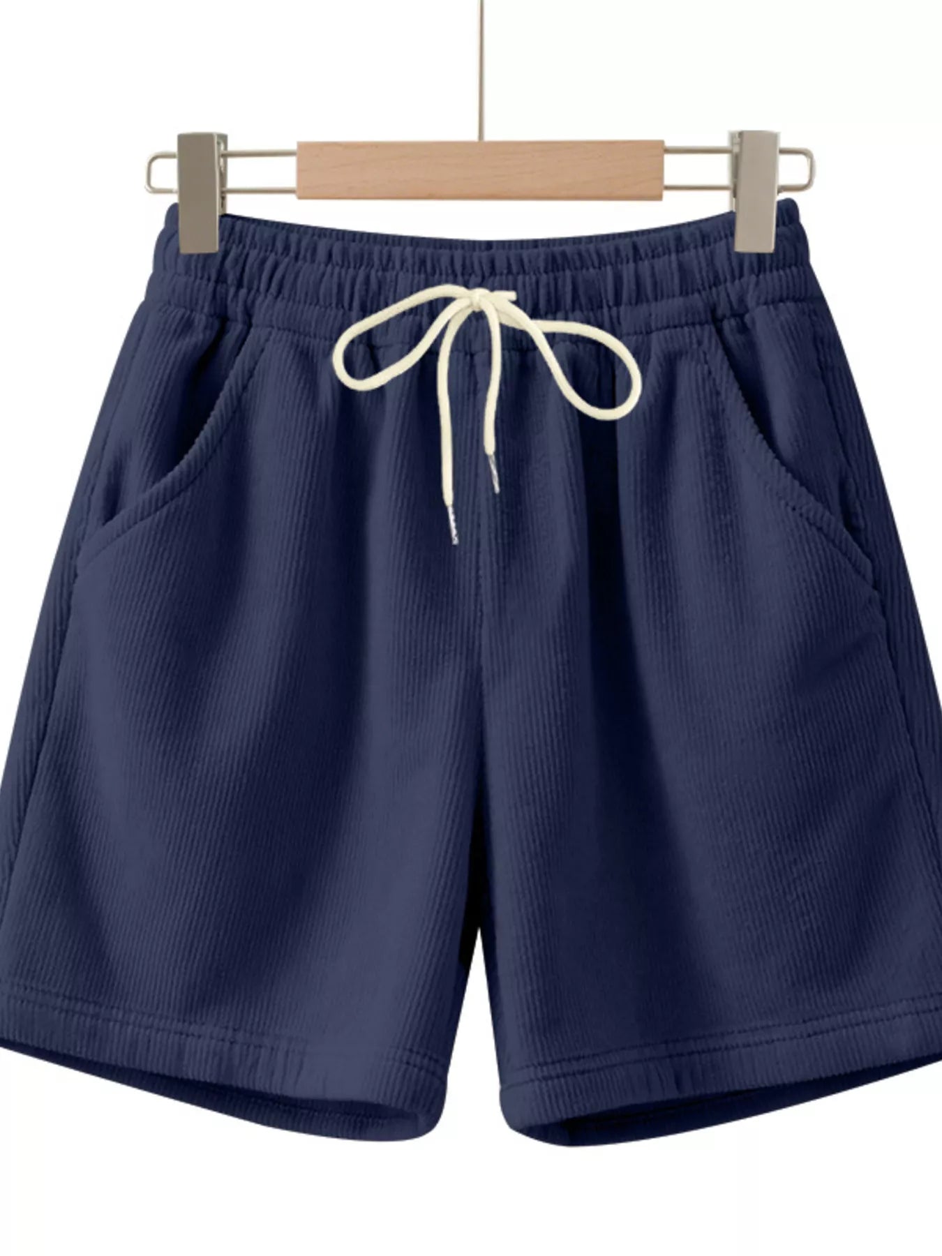 NEWYORKLISTED ATLAS MEN'S COLLECTION: Navy blue shorts with a drawstring on a white background