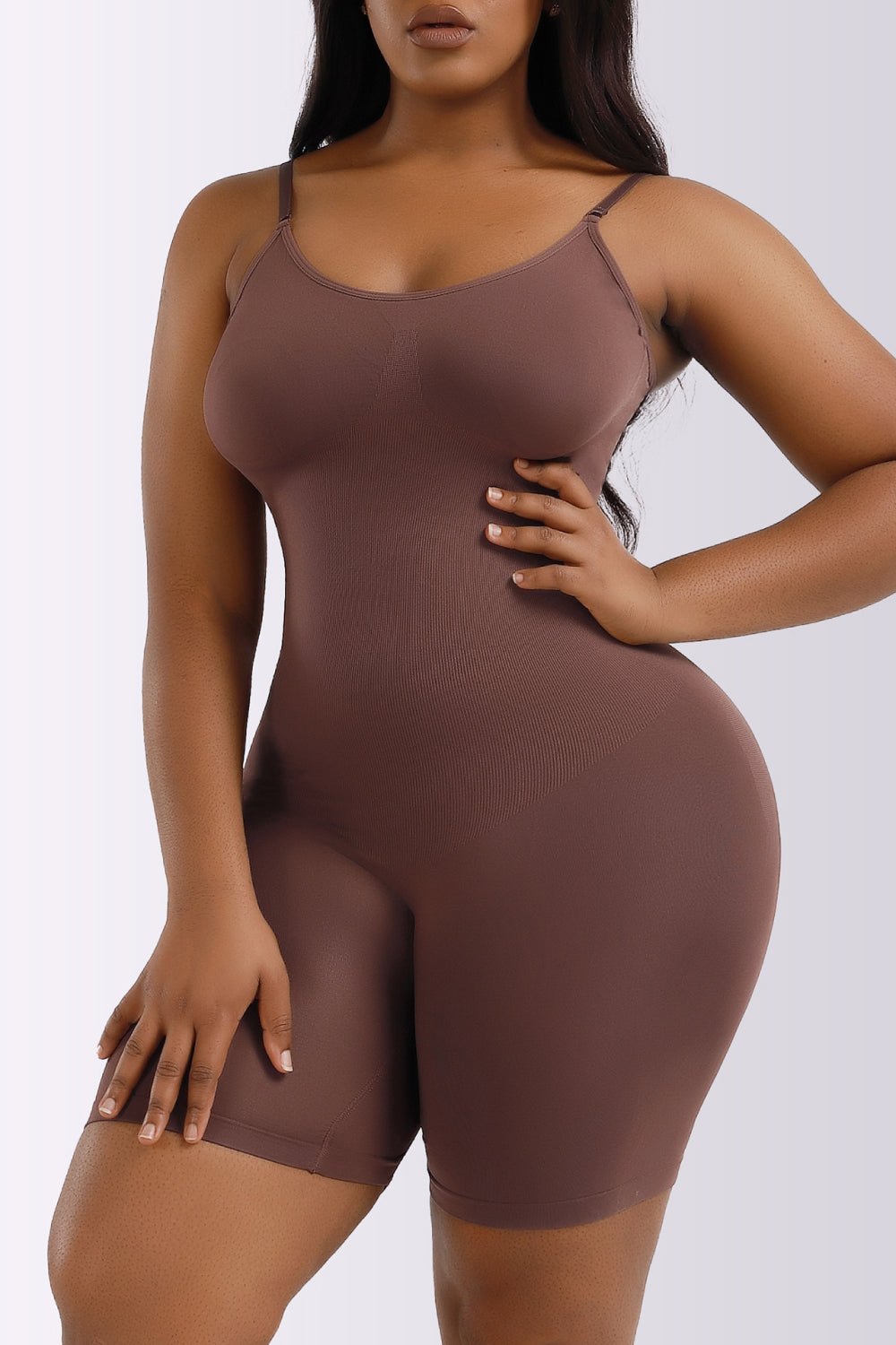 NEWYORKLISTED Intimate Apparel Collection: Brown shapewear bodysuit worn by a model on a white background