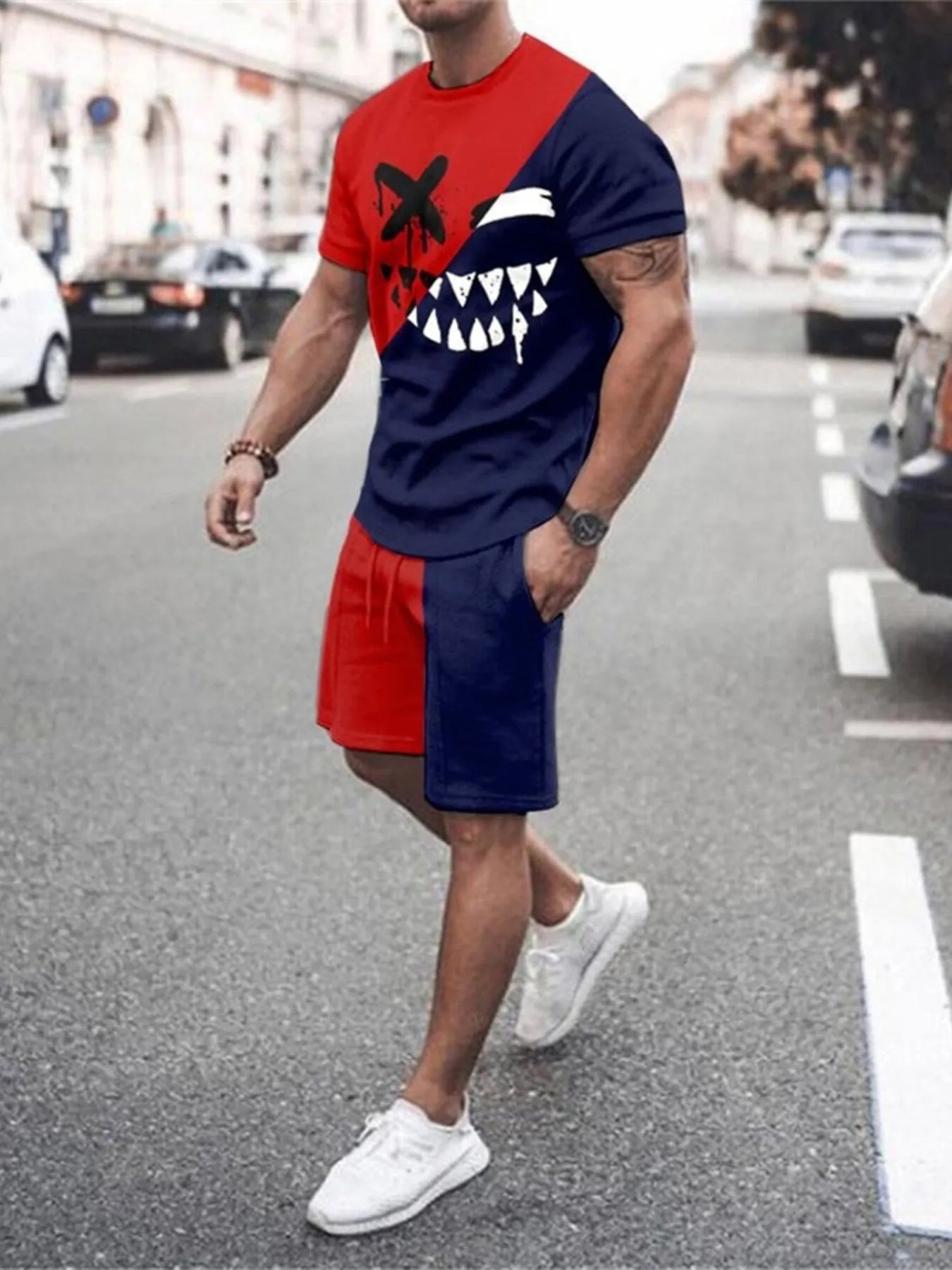 NEWYORKLISTED ATLAS MEN's COLLECTION: Person wearing a red and blue outfit with a shark graphic on a street.