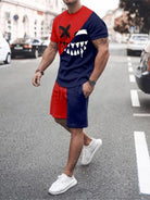 NEWYORKLISTED ATLAS MEN's COLLECTION: Person wearing a red and blue outfit with a shark graphic on a street.