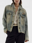 NEWYORKLISTED STYLE COLLECTION: Person wearing a light blue denim jacket on a white background
