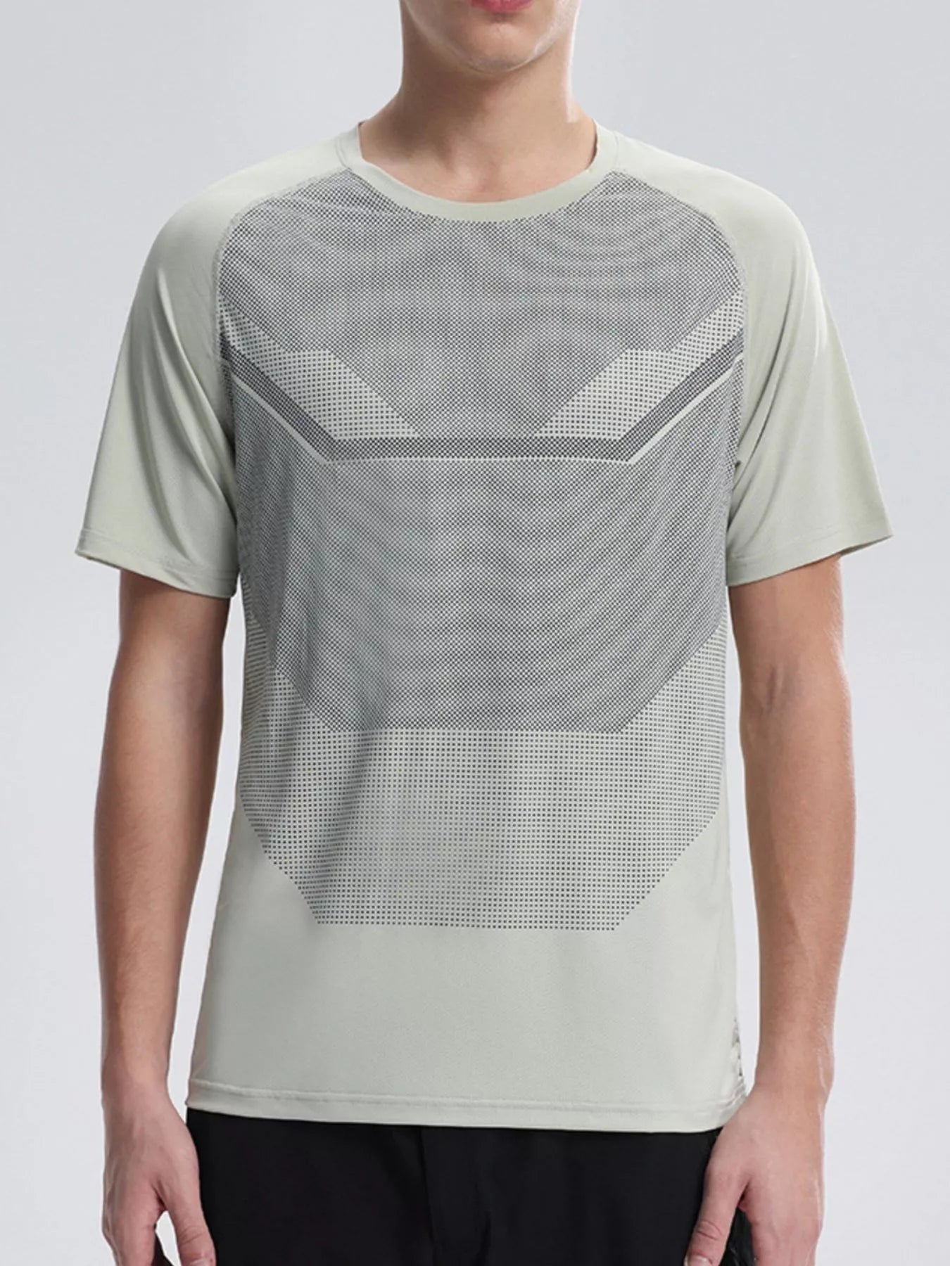 NEWYORKLISTED ATLAS MEN'S COLLECTION: Person wearing a light green athletic shirt with geometric pattern on a plain background