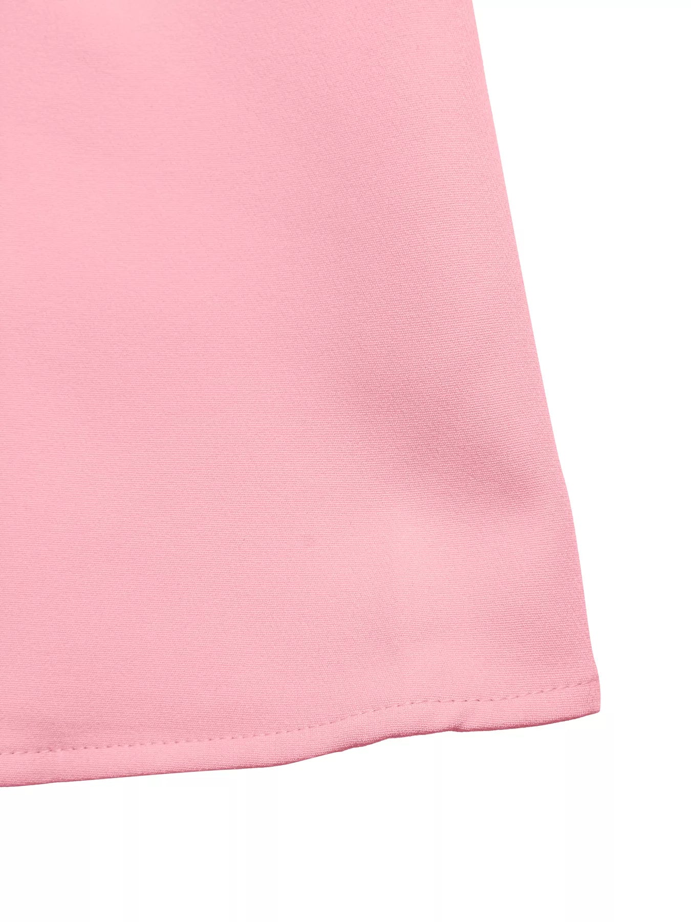 NEWYORKLISTED STYLE COLLECTION: Close-up of a pink fabric corner on a white background
