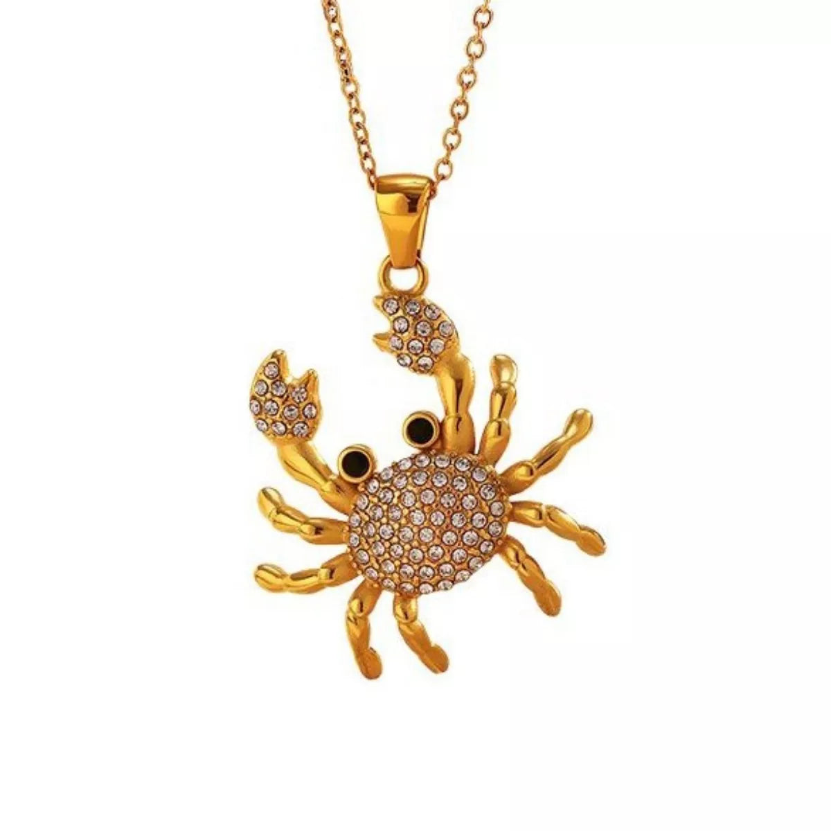 NYLD Glamour Collection by NEWYORKLISTED: Gold crab-shaped pendant necklace on a white background