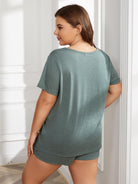 NEWYORKLISTED Intimate Apparel Collection: Woman wearing a green pajama set in a bright room.