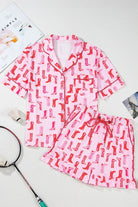 NEWYORKLISTED Intimate Apparel: Pink pajama set with red boot pattern on a white background
