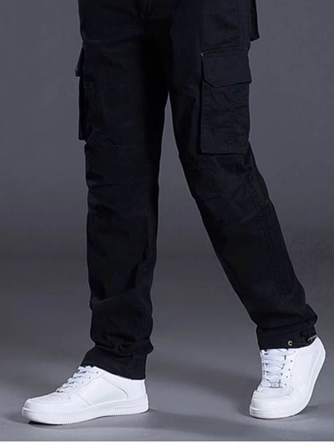 NEWYORKLISTED ATLAS MEN's COLLECTION: Black cargo pants worn by a person on a gray background