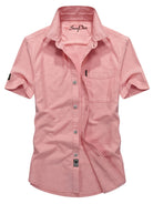 NEWYORKLISTED ATLAS MEN's COLLECTION: Pink short-sleeve shirt with brand logo on a white background