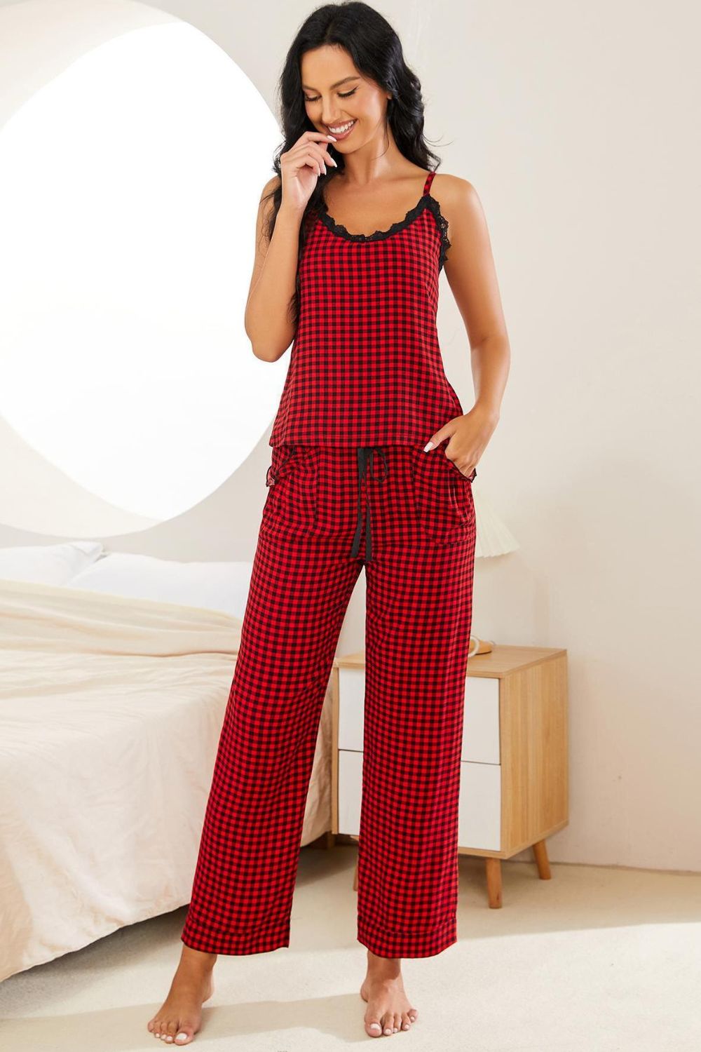 NEWYORKLISTED Intimate Apparel: Woman wearing red plaid pajamas in a bedroom setting