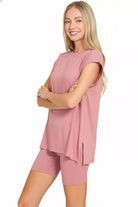 NEWYORKLISTED Comfort Collection: Woman wearing a pink outfit with a plain background